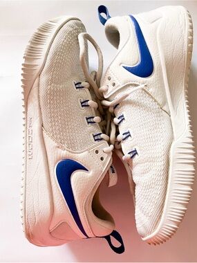Nike White Sneakers with Blue Swoosh Accents